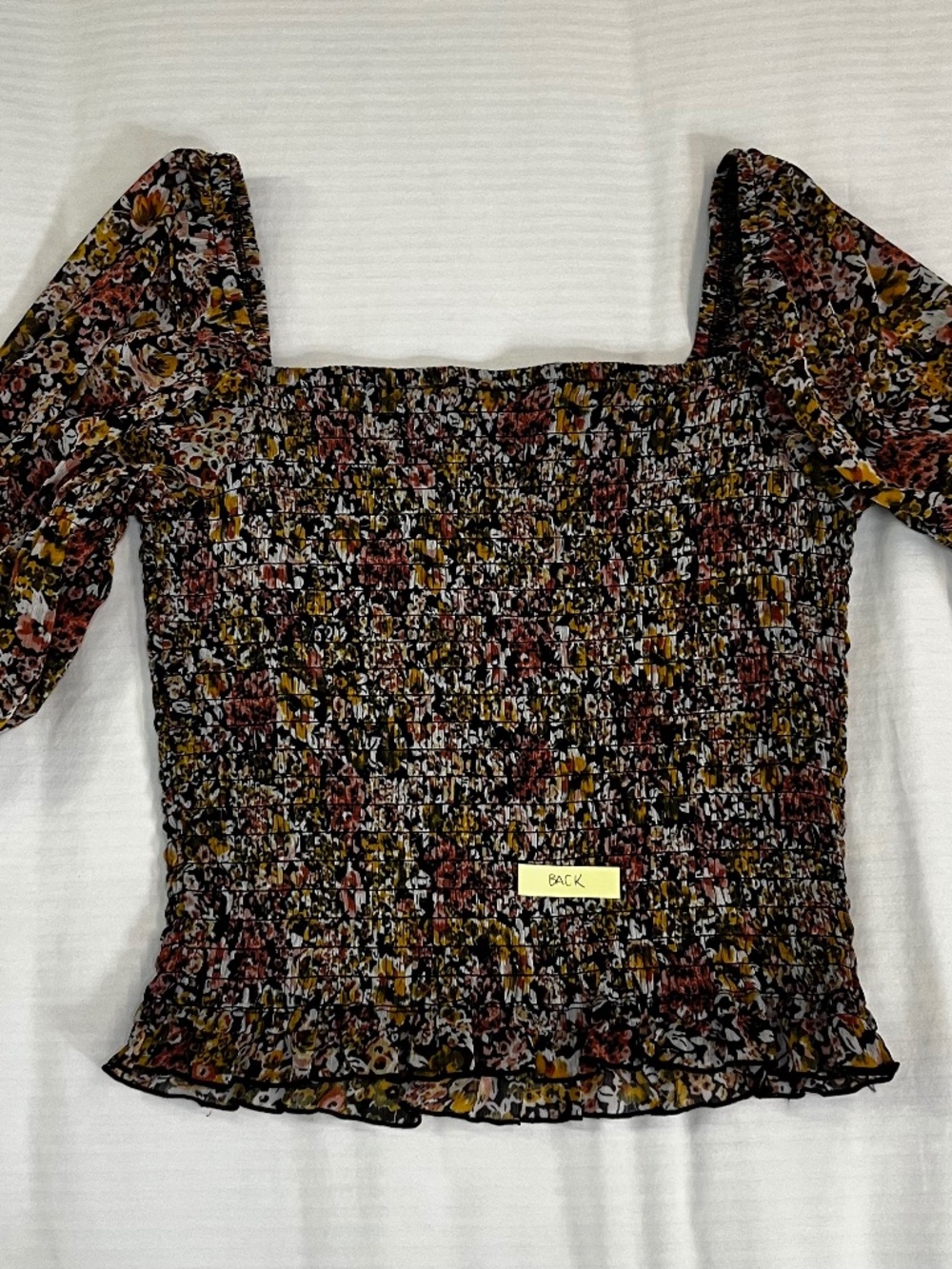 I.N. San Francisco smocked floral cropped top with square neck and long sleeves